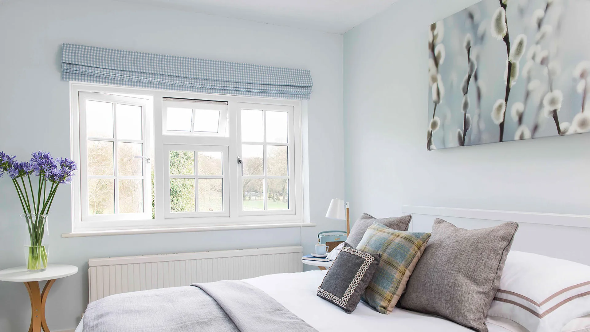 Light blue checkered window blinds light pastel bedroom