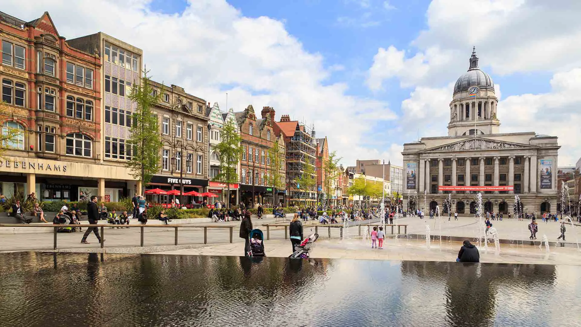City square with shops and fountain