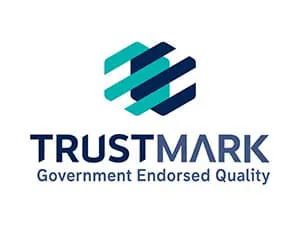Trustmark logo teal and navy blue hexagon