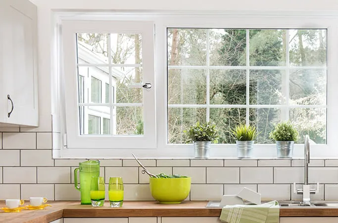 White Everest conservatory window with divided panes