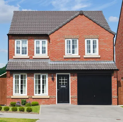 Brick house with white windows and black door