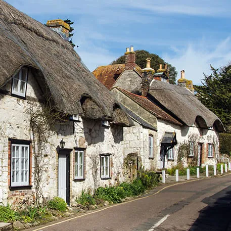 Row of traditional thatched cottages