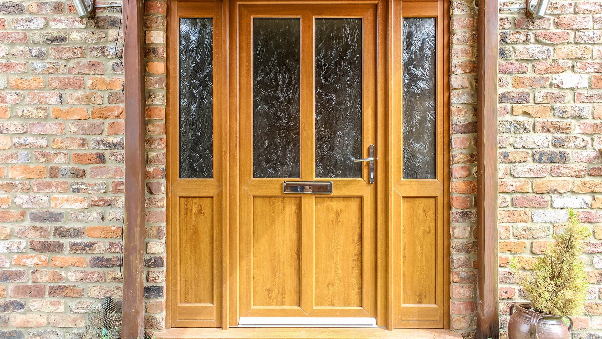 Light brown wooden door with frosted glass panels