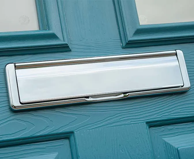 Teal Everest conservatory door with chrome letterbox