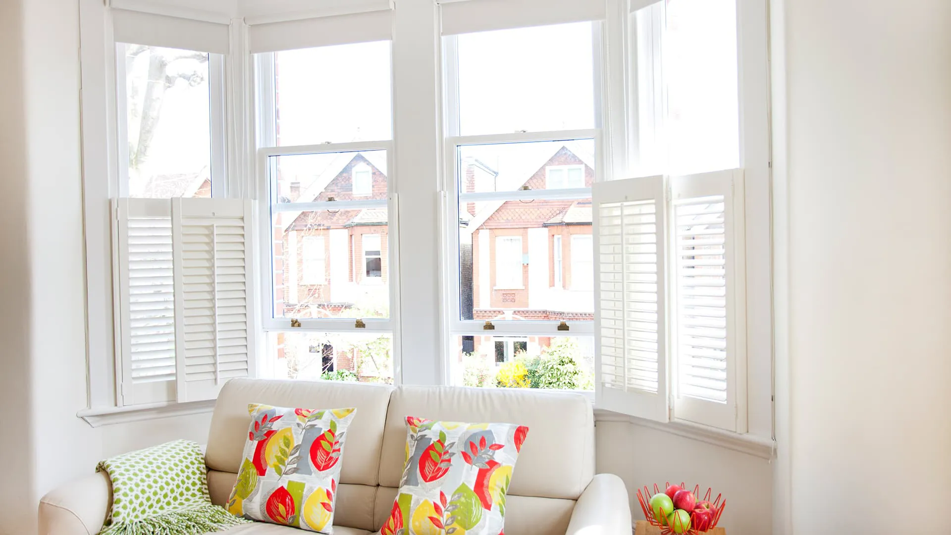 White Everest conservatory windows with shutters