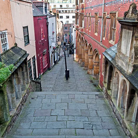 Cobblestone street with colorful buildings