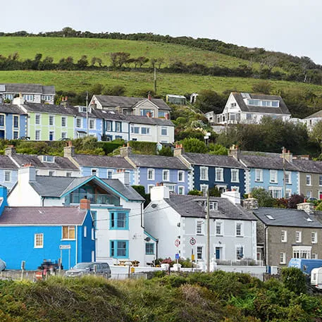 Colorful houses cascading up a hill