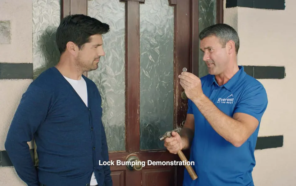 Man demonstrating lock bumping technique