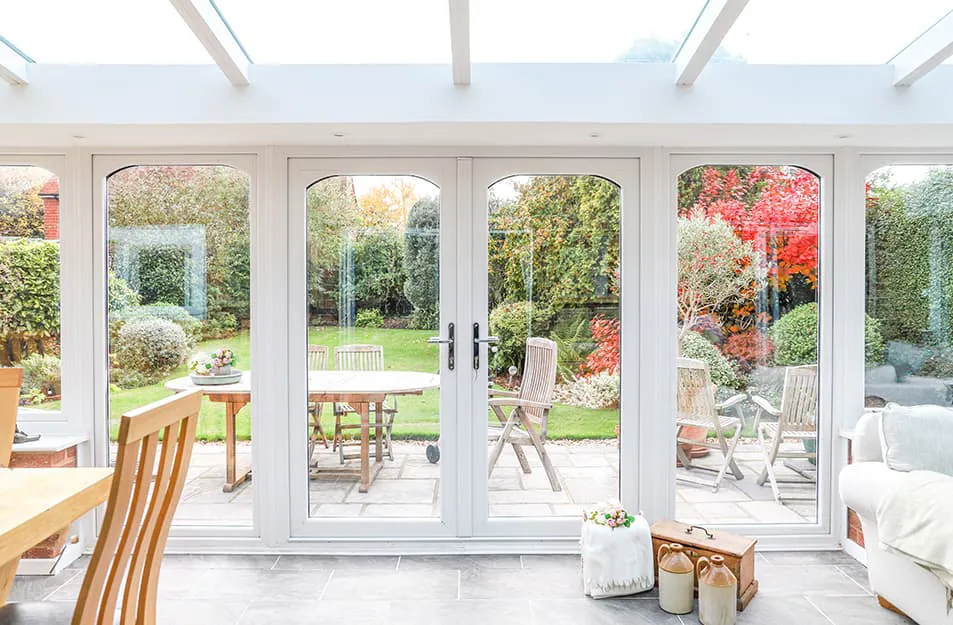 White Everest conservatory with garden view