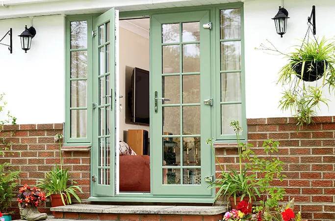 Sage green Everest conservatory double doors open