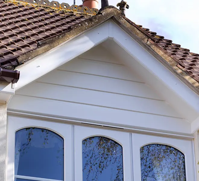 White siding and gables on a house