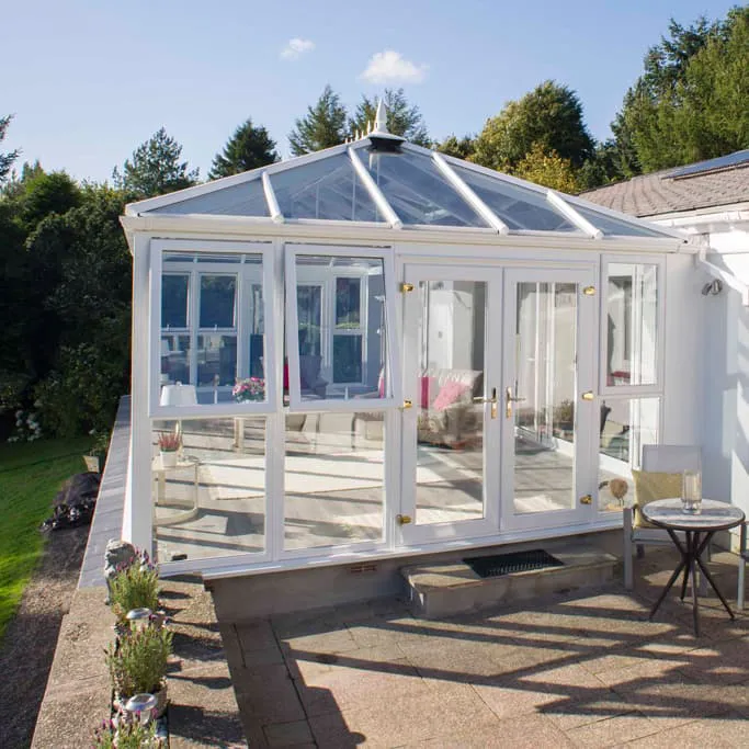 White Everest conservatory with glass roof and doors