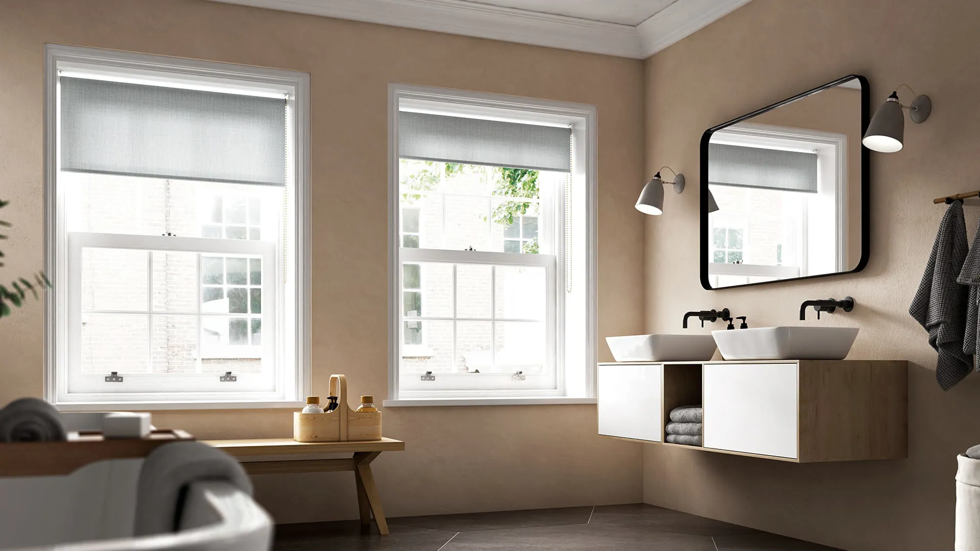 Beige bathroom with two windows and a vanity unit