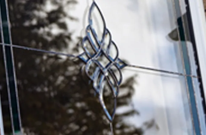 Detailed decorative glass design on Everest conservatory window