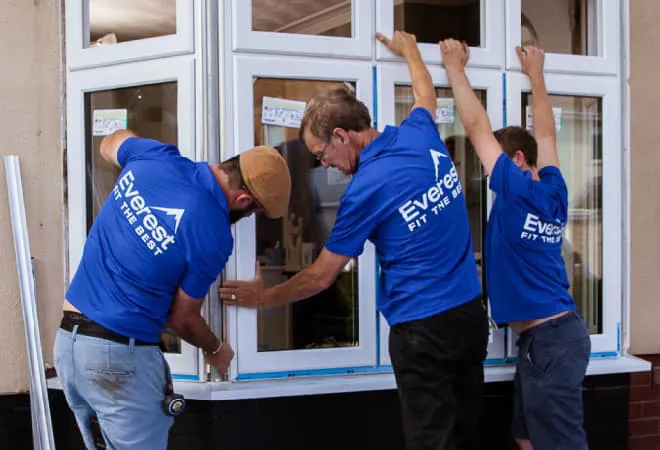 Everest conservatory installers in blue shirts