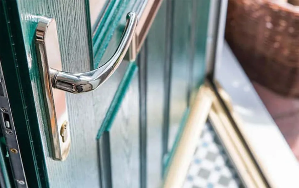 Everest conservatory door with teal colored glass and silver handle