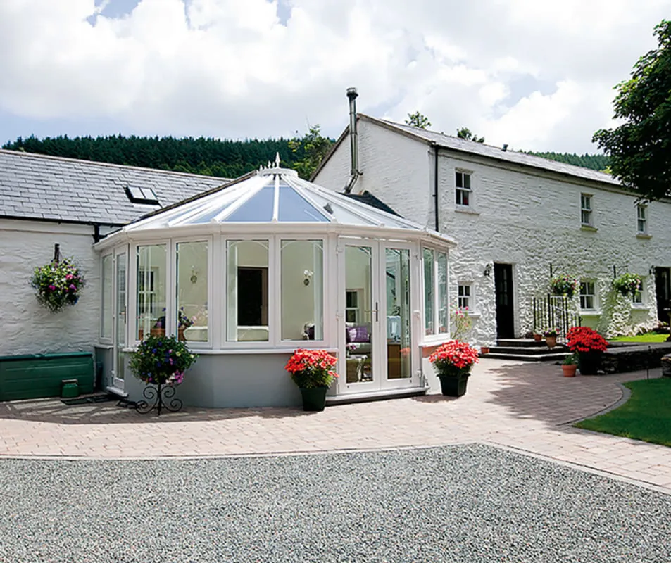White Everest conservatory with windows and plants