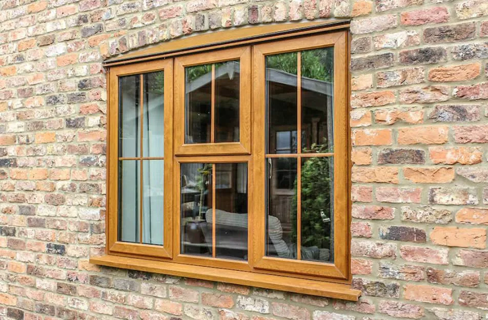 Wooden Everest conservatory window on brick wall
