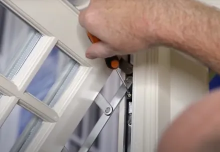 Person working on Everest conservatory window frame