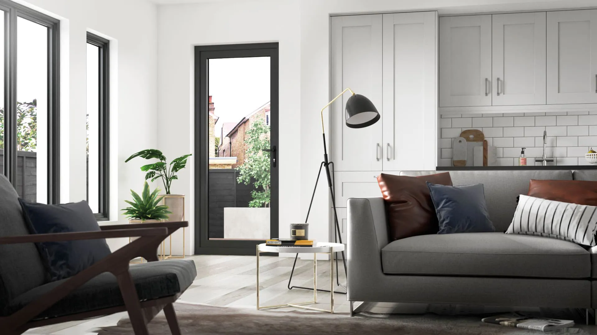 Modern living room with gray sofa, dark gray chair, and white coffee table