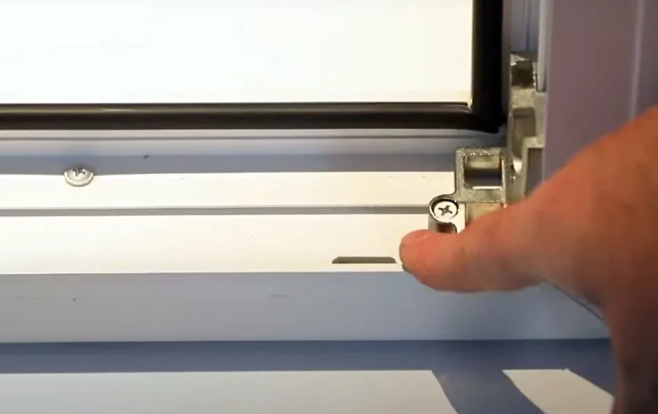 Everest window frame adjustment screw