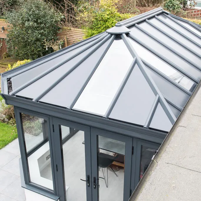 Grey Everest conservatory roof with glass panels