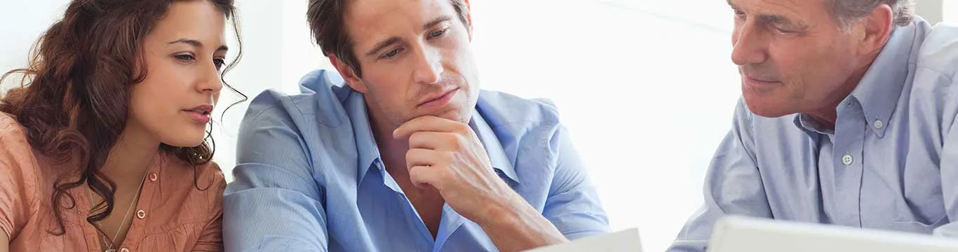 People looking at documents