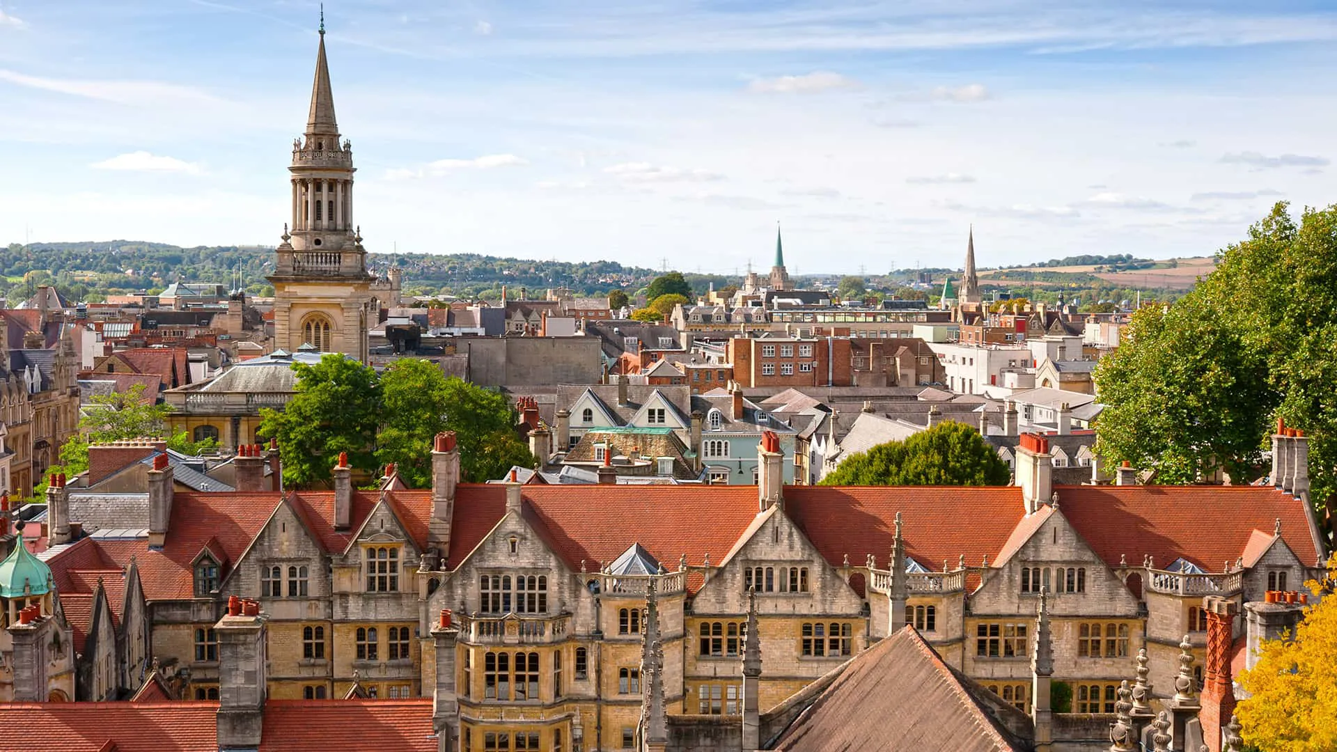 Cityscape view of historic buildings with red roofs