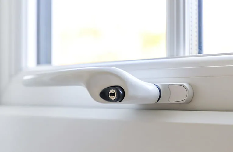 White window handle with lock and security features