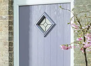 Light purple door with diamond-shaped window